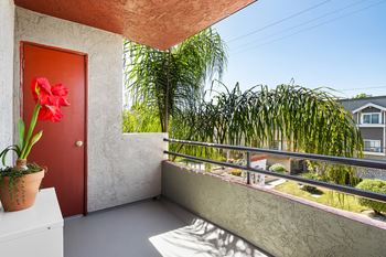 Bedroom Balcony at Woodland Trio Apartments, North Hollywood